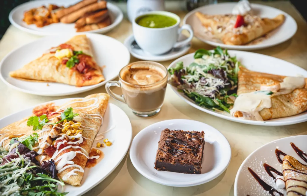 Selection of crêpes, salad, coffee and desserts at Taste of Paris.